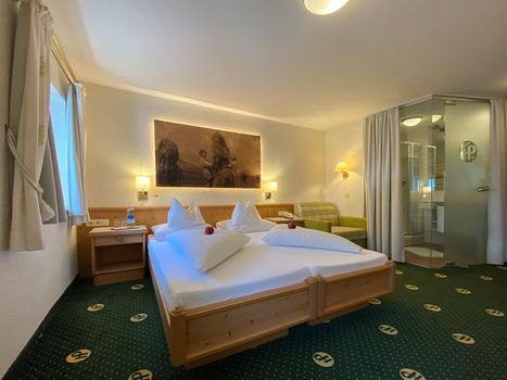 Die komfortablen Doppelzimmer Hochfeiler sorgen für einen angenehmen Aufenthalt im Hotel Pachmair. 